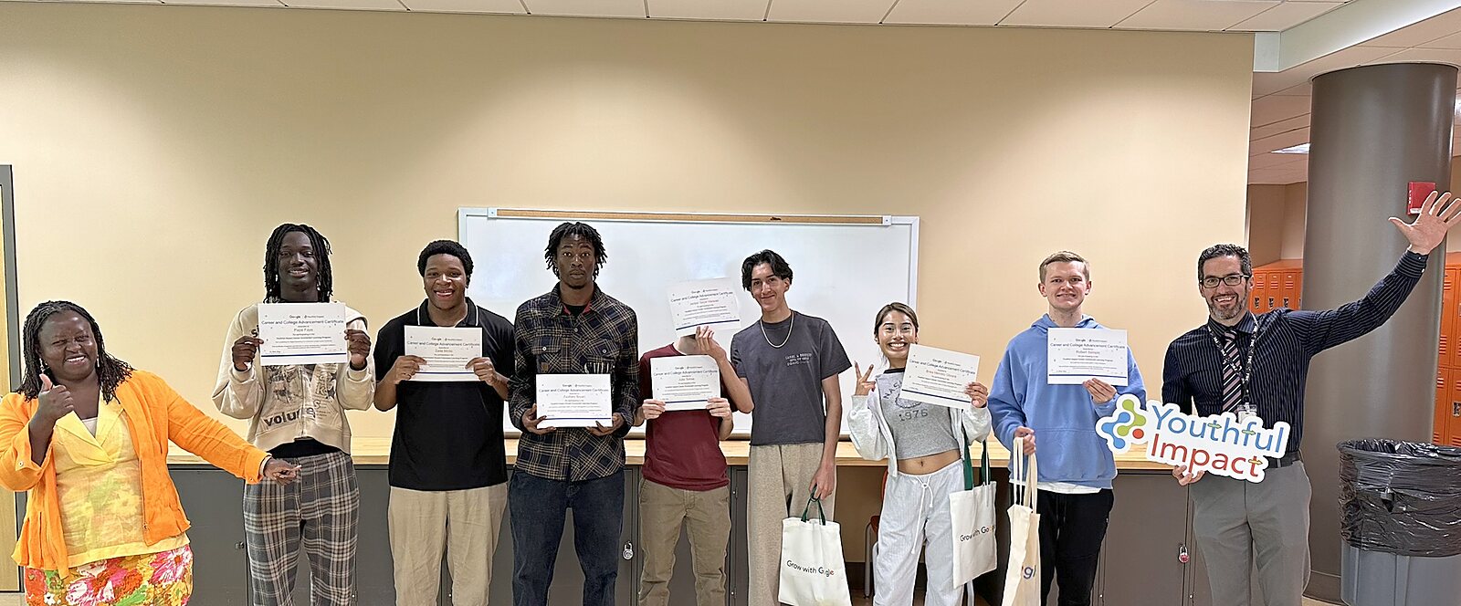 The Fairchild Wheeler cohort holding their Career and College Advancement Certificates, June 1, 2026