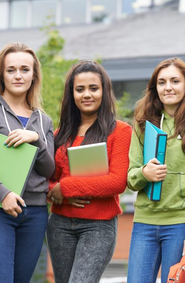 Portrait Of Student Group Outside College Building