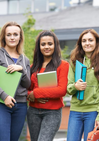 Portrait Of Student Group Outside College Building