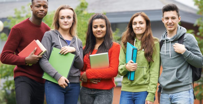 Portrait Of Student Group Outside College Building