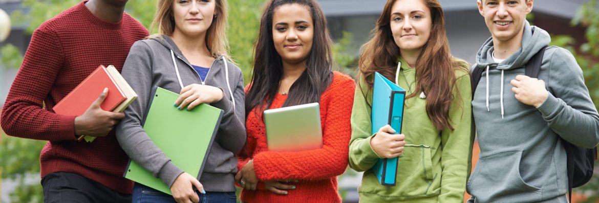 Portrait Of Student Group Outside College Building